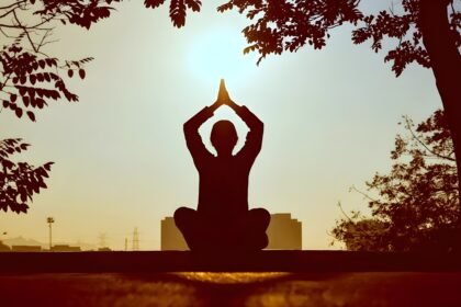 Person practicing mindfulness meditation for stress relief